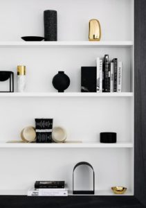 How to make a small room feel larger with negative space on shelves