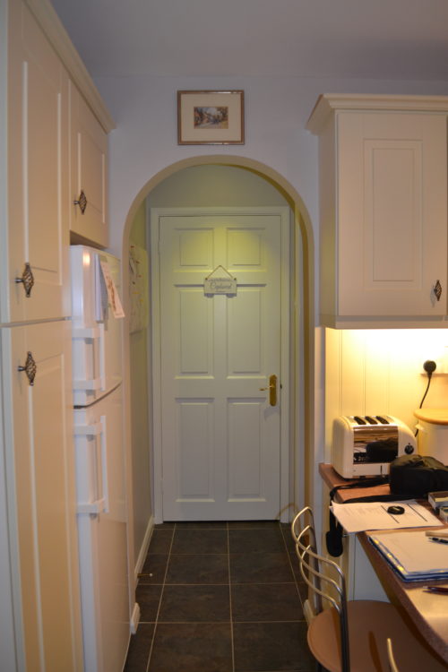 Archway between old kitchen and dining room